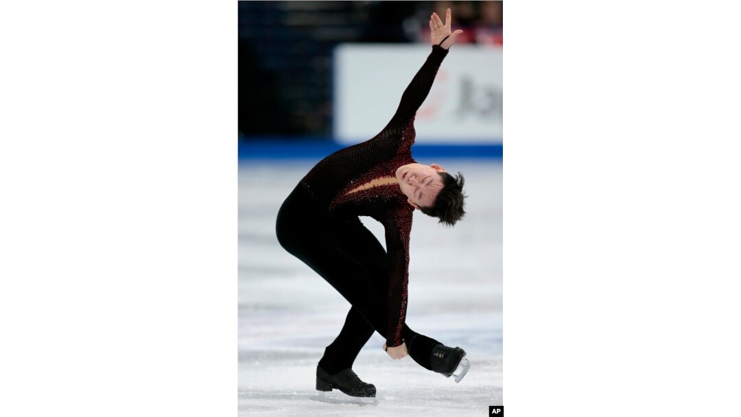 FILE - Denis Ten, of Kazakhstan, skates his free program at the World figure skating championships in Helsinki, Finland, on Apr. 1, 2017.