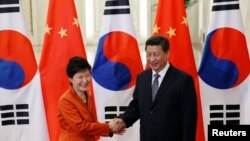 習近平(右)和朴槿惠(左) (資料圖片)