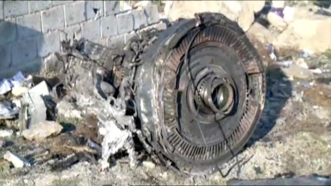 One of the engines of Ukraine International Airlines flight PS752, a Boeing 737-800 plane that crashed after taking off from Tehran's Imam Khomeini airport on Jan. 8, 2020, is seen in this still image taken from Iran Press footage.