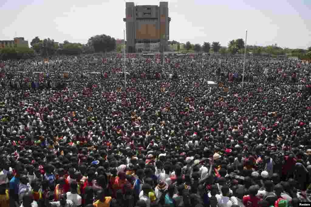 Anti-government protesters gather in the Place de la Nation in Ouagadougou, capital of Burkina Faso, Oct. 31, 2014.