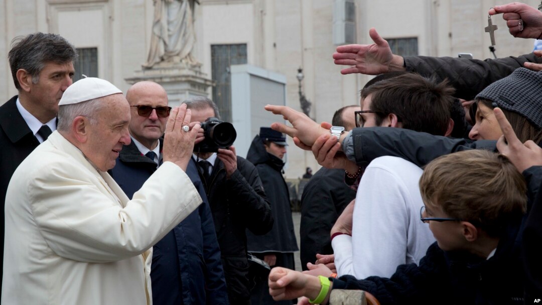 Pope Francis blesses faithful during his weekly general audience, in St. Peter's Square, at the Vatican, Feb. 14, 2018.