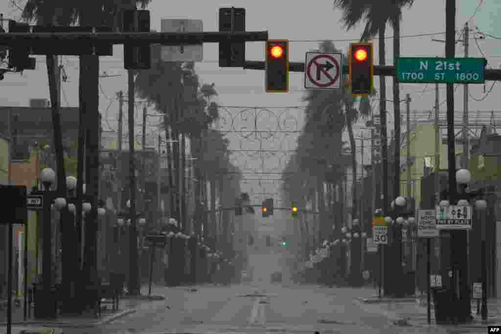 Wind and rain pick up in the Ybor City neighborhood ahead of Hurricane Ian making landfall on Sept. 28, 2022 in Tampa, Florida.