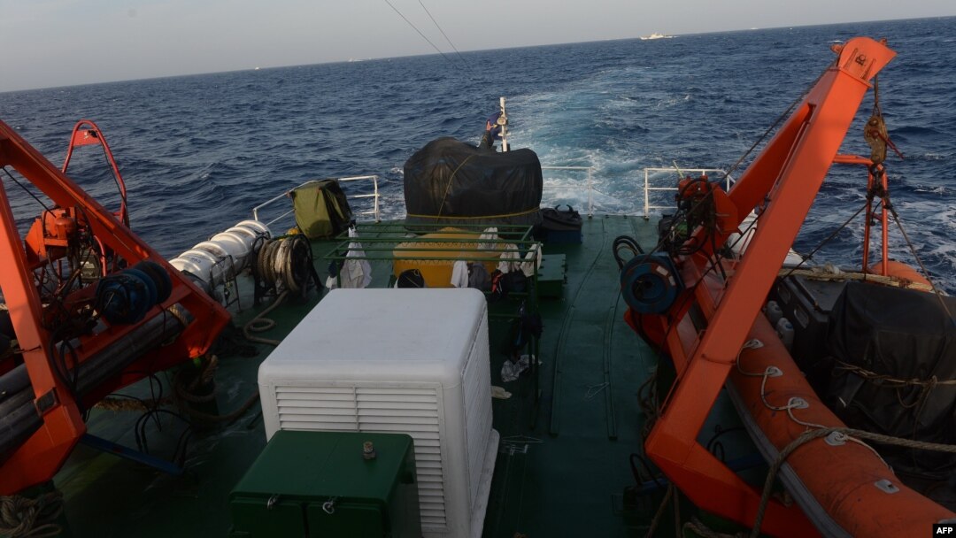 FILE - Image from a Vietnam Coast Guard ship on May 13, 2014 shows a covered gun-machine on the deck during a patrol near China's oil drilling rig in disputed waters in the South China Sea. 