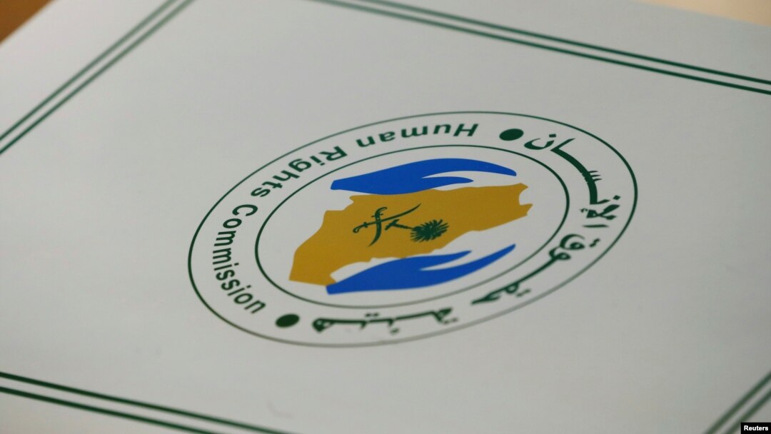 FILE - A folder with a logo of the Human Rights Commission of Saudi Arabia is pictured on a desk during the Universal Periodic Review of Saudi Arabia by the Human Rights Council at the United Nations Office in Geneva, Switzerland.