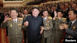 North Korean leader Kim Jong Un reacts during a celebration for nuclear scientists and engineers who contributed to a hydrogen bomb test, in this undated photo released by North Korea's Korean Central News Agency in Pyongyang, Sept. 10, 2017. 
