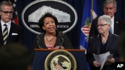 Attorney General Loretta Lynch, center, with Environmental Protection Agency (EPA) Administrator Gina McCarthy, Acting Deputy Secretary Russell Deyo for the Department of Homeland Security, and FBI Deputy Director Andrew McCabe, speak during a news conference at the Justice Department in Washington, Wednesday, Jan. 11, 2017, announcing criminal and civil resolutions with Volkswagen.