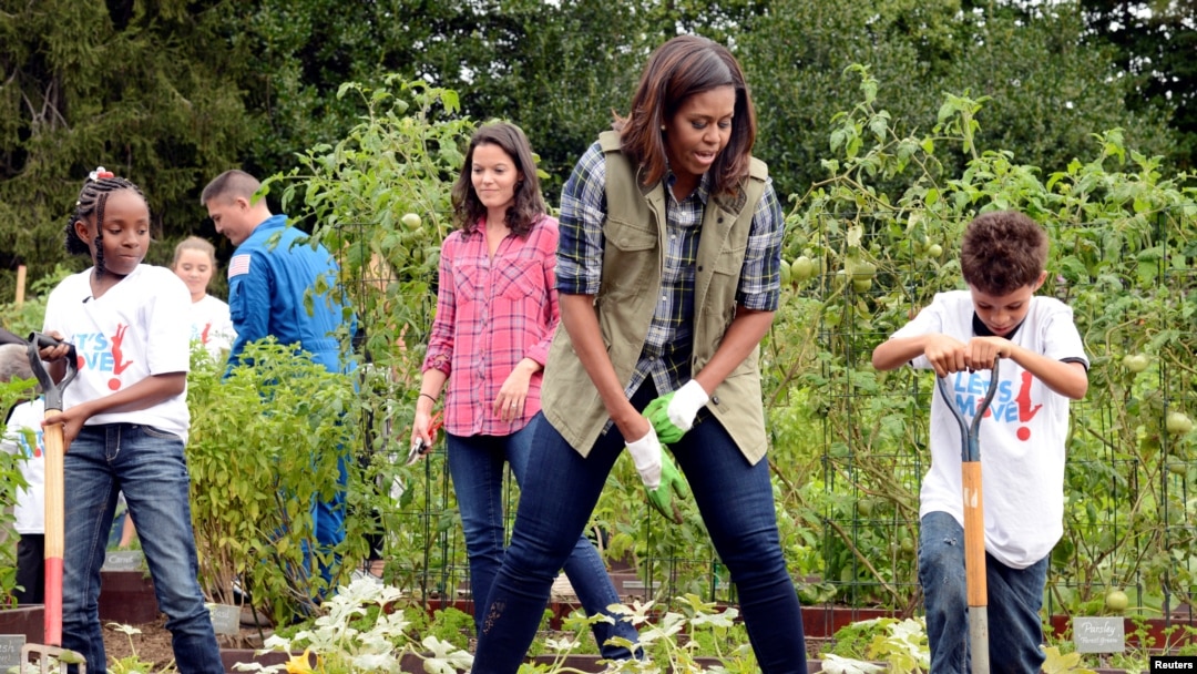 First lady Michelle Obama was joined in the White House kitchen garden Thursday by students from across the country for the last harvest of the Obama era.