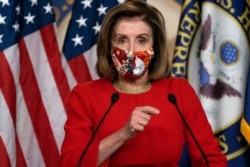 FILE - House Speaker Nancy Pelosi of California speaks during her weekly briefing, Dec. 4, 2020, on Capitol Hill in Washington.