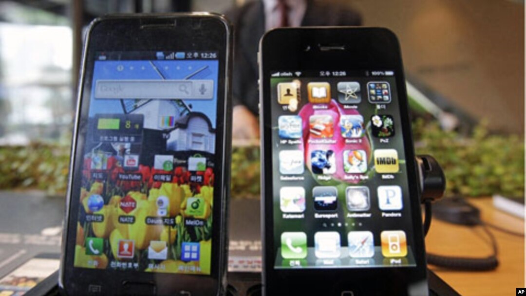 Samsung Electronics' Galaxy S, left, and Apple's iPhone 4 are displayed. South Korea's Samsung Electronics Co. says it sued Apple Inc. for patent rights violations, only days after Apple sued Samsung for the same reason, (File)