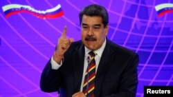 El presidente de Venezuela, Nicolás Maduro, habla durante un encuentro con la prensa durante visita del viceprimer ministro ruso, Yury Borisov, a Caracas, el 16 de febrero de 2022. Foto: Reuters.