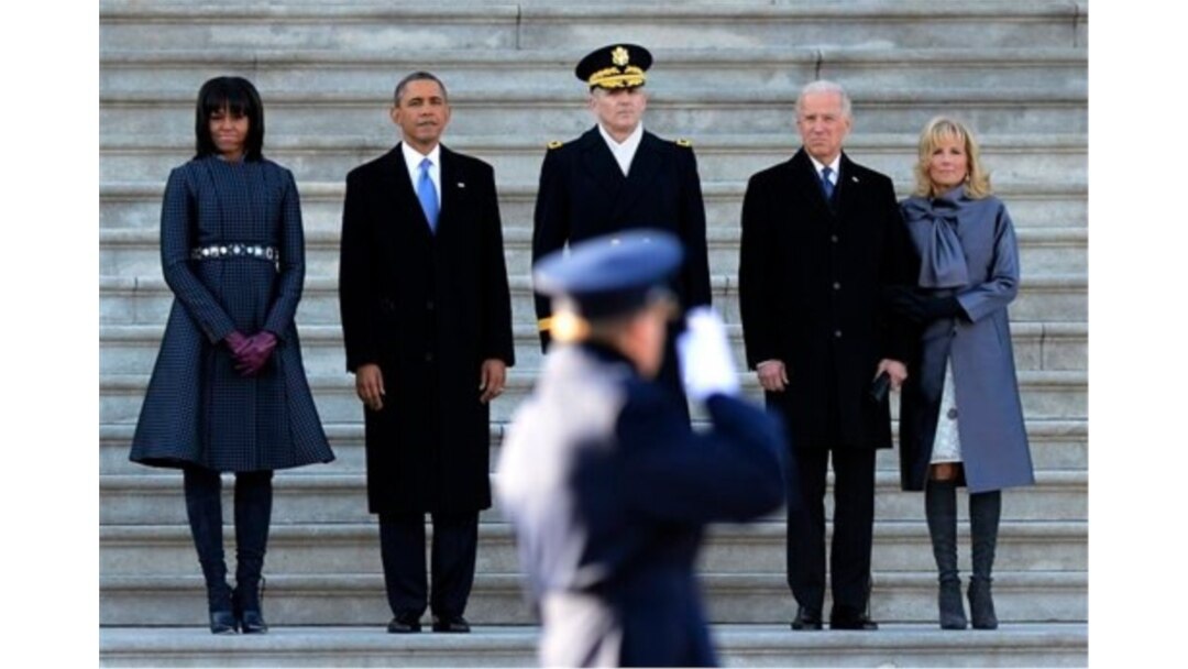 FILE - Dr. Jill Biden, right, stands with first lady Michelle Obama, left, newly inaugurated President Barack Obama, second left, and Vice President Joe Biden, second right, at the Capitol in Washington, Jan. 21, 2013.