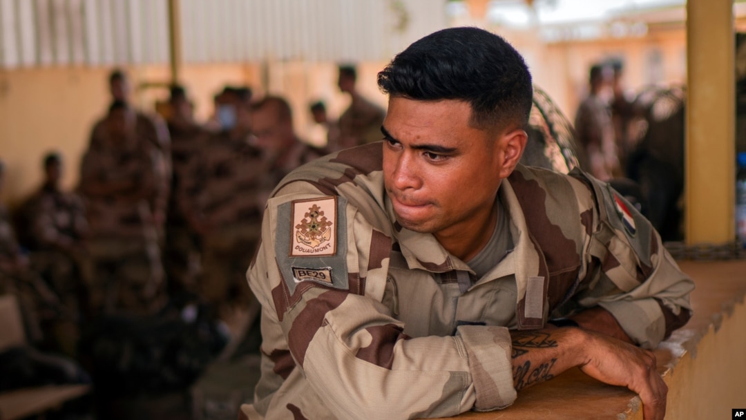 FILE - In this June 9, 2021, photo, French Barkhane force soldiers who wrapped up a four-month tour of duty in the Sahel leave their base in Gao, Mali. 