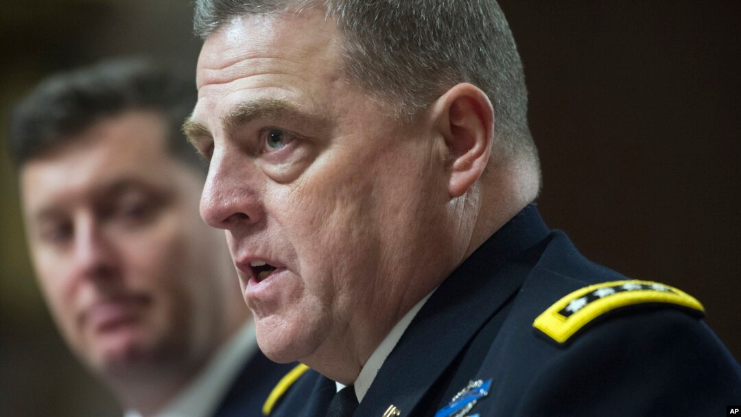 Army Undersecretary Patrick Murphy listens at left as Army Chief of Staff Gen. Mark Milley testifies on Capitol Hill in Washington at a Senate hearing to examine the implementation of the decision to open all ground combat units to women, Feb. 2, 2016.