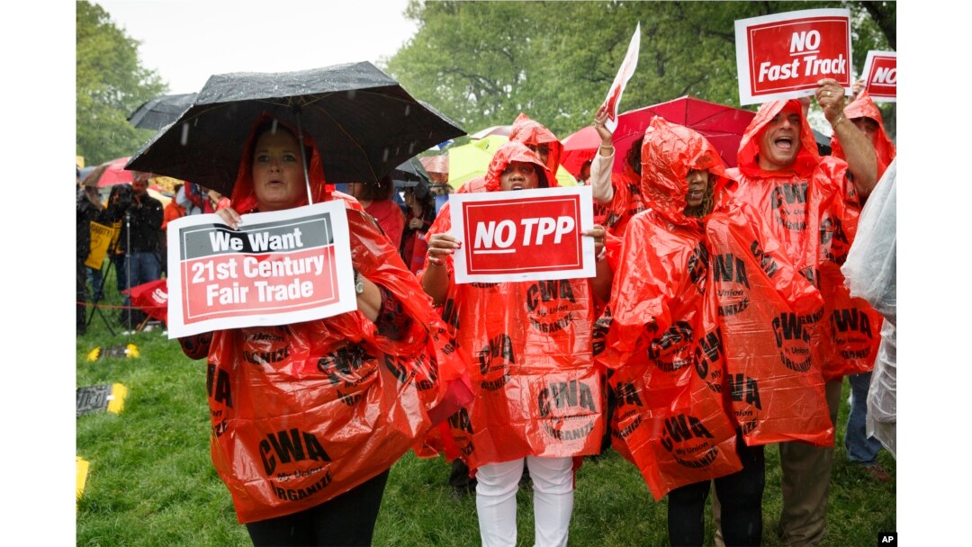FILE - Demonstrators rally for fair trade at the Capitol in Washington.