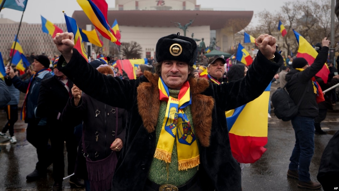 A man clenches his fists during a protest in Bucharest, Romania, March 1, 2025.