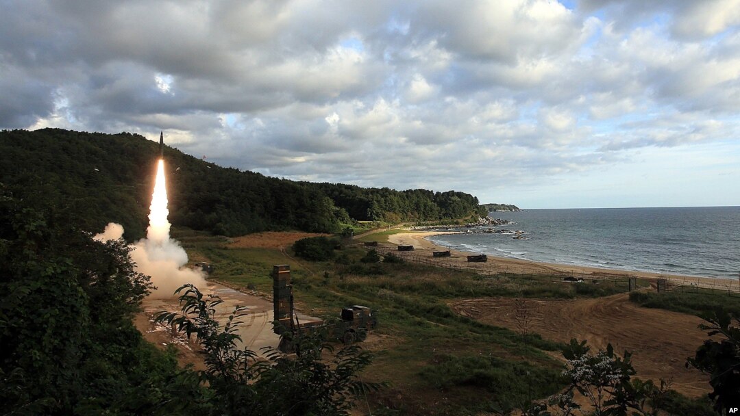 In this photo provided by the South Korea Defense Ministry, South Korea's Hyunmoo II ballistic missile is fired during an exercise at an undisclosed location in South Korea, Sept. 15, 2017.