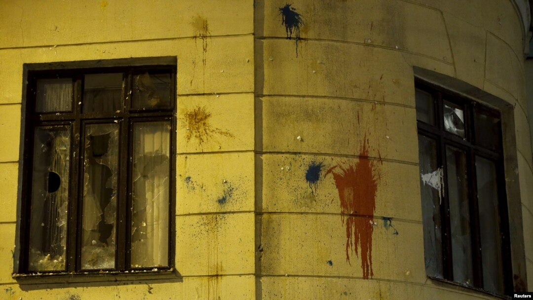 Windows of Turkish embassy smashed in reaction to downing of Russian war plane, Moscow, Nov. 25, 2015.