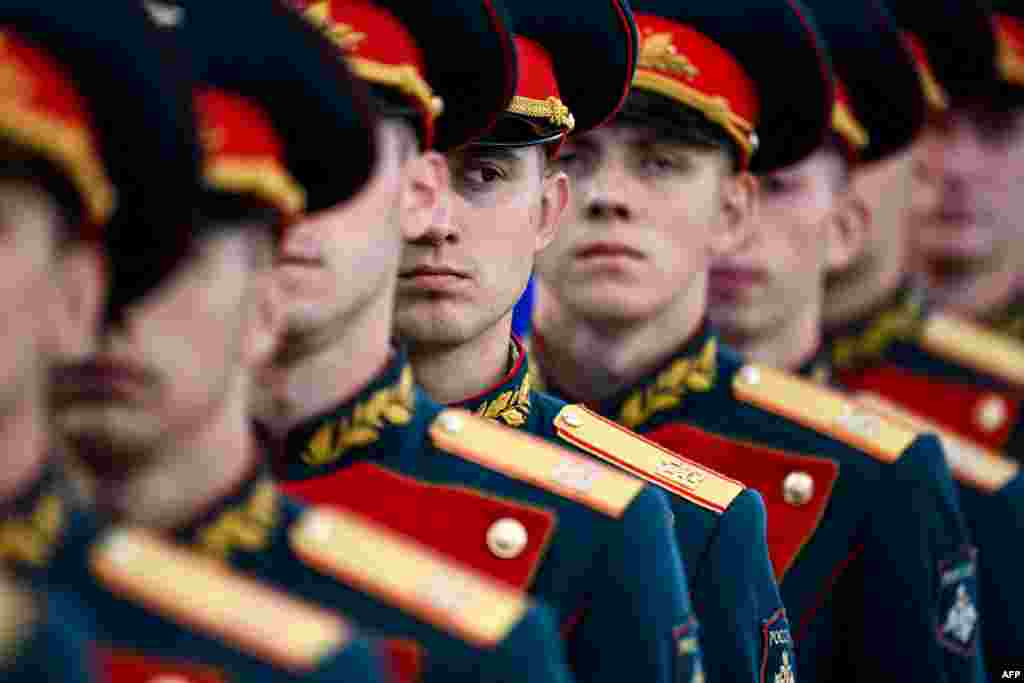 Russian honour guards look on after the opening ceremony of the International Military-Technical Forum "Army-2021" held in the Patriot Park, Kubinka, near Moscow.