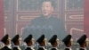 资料照片: 2019年10月1日习近平阅兵讲话视频前的军人