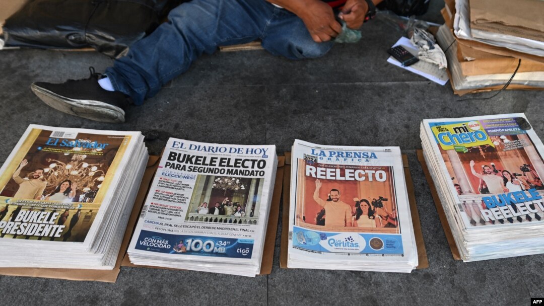 FILE - Newspapers sit stacked the day after elections in San Salvador, El Salvador, Feb. 5, 2024. The work of journalists in El Salvador is becoming tougher, with an increase in efforts to harass or block them from reporting in the past year, says a media association.