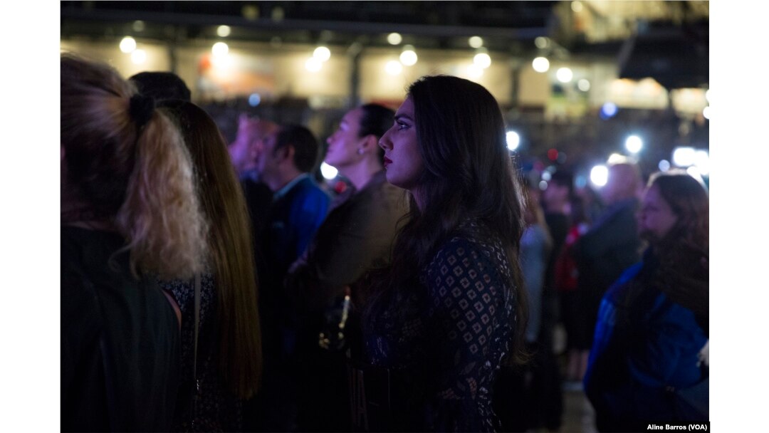 A Beto O’Rourke supporter attentively watches O’Rourke concession speech on Tuesday night, Nov. 6, 2018, after midterm election results.