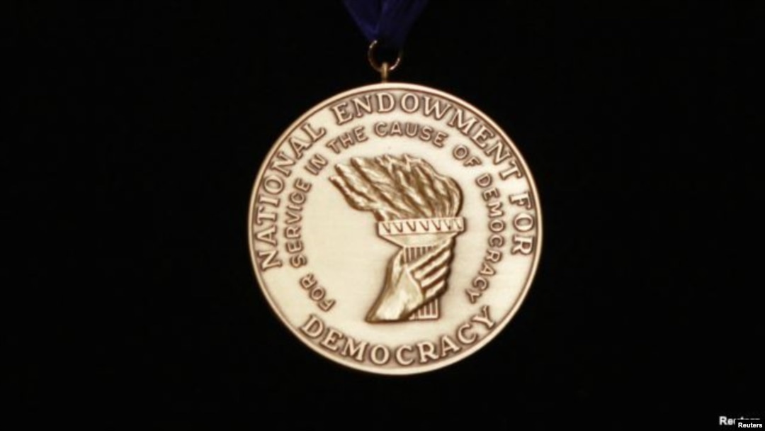 FILE - The National Endowment for Democracy's Democracy Service Medal is displayed at the Library of Congress in Washington. 
