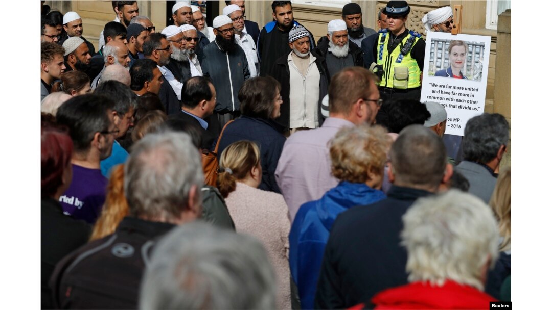 People gather during a vigil for Labour Member of Parliament Jo Cox, in Batley near Leeds, in Britain, June 17, 2016.