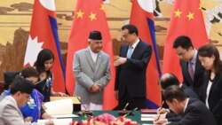尼泊尔总理奥利在人民大会堂会见中国总理李克强。（2018年6月21日）