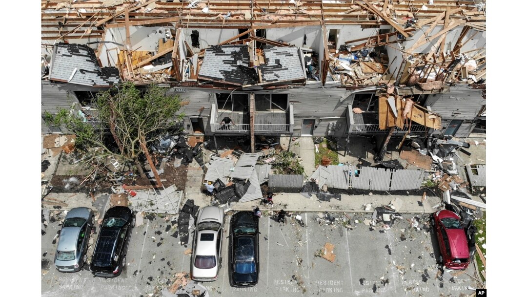 Debris is strewn about the front sidewalks of destroyed homes at the River's Edge apartment complex the day after a tornado struck the city, in Dayton, Ohio, May 28, 2019.