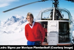 Francois-Xavier Bagnoud standing by a search-and-rescue helicopter.