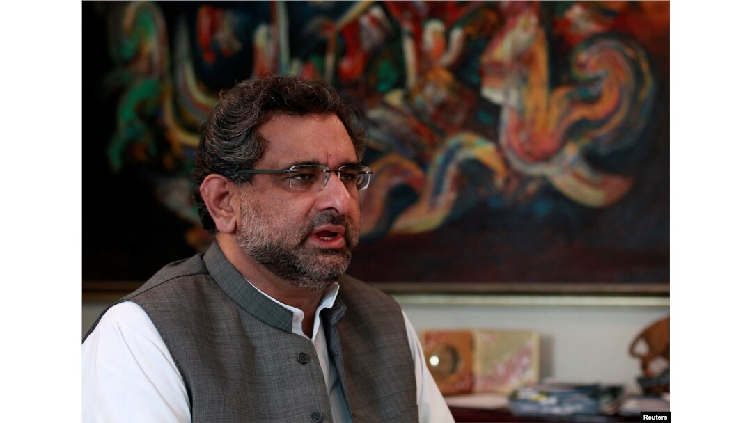 FILE - Pakistan's Petroleum and Natural Resources Shahid Khaqan Abbasi speaks during an interview at his office in Islamabad, Pakistan, Nov. 8, 2013.