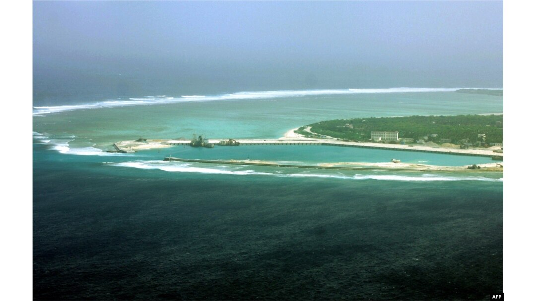 FILE - This file aerial view taken on July 27, 2012 shows part of the city of Sansha on the island of Yongxing, also known as Woody island in the disputed Paracel chain, which China considers part of Hainan province.