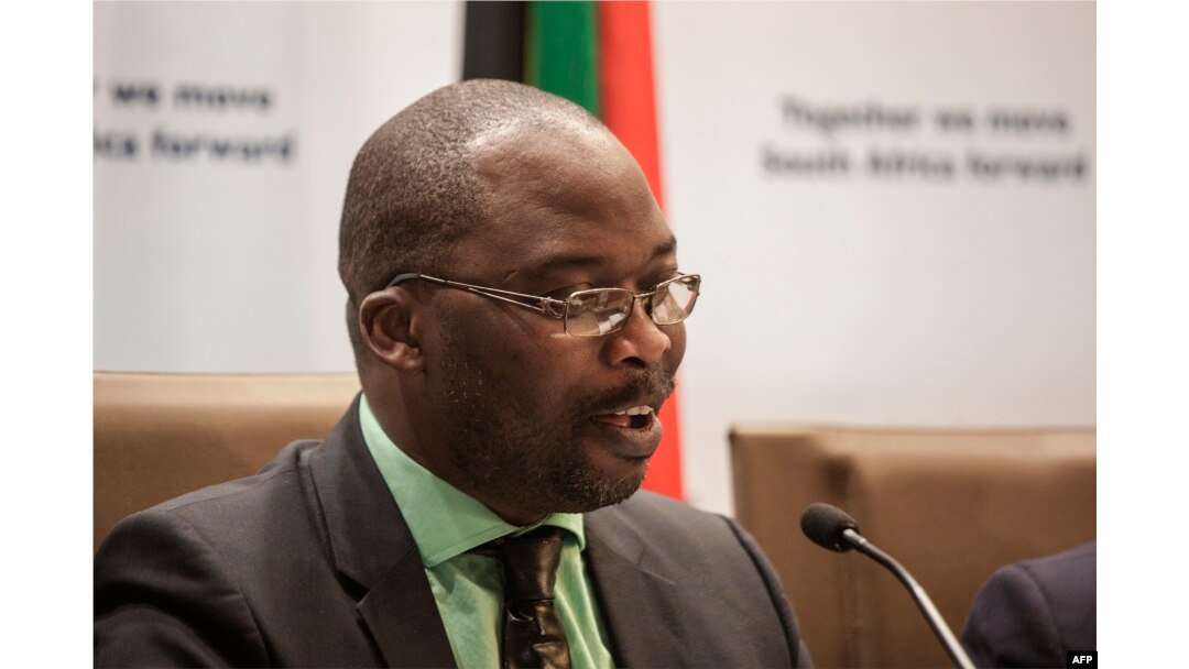 FILE - South Africa's minister of justice and correctional services, Michael Masutha, speaks to the press in Pretoria, South Africa, Oct. 21, 2016.