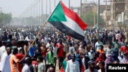 Thousands march in Khartoum on June, 30, 2020, demanding justice for the people killed by security forces during last year’s street protests.