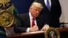 Official: White House Delays Revamped Immigration Order to Next Week