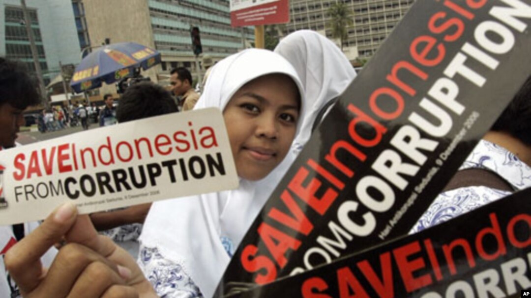 An Indonesian high school student carries stickers in Jakarta, (File)