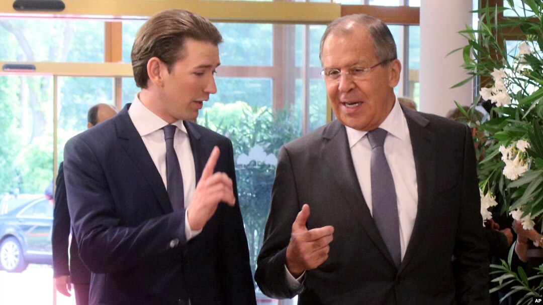 Austrian Foreign Minister Sebastian Kurz talks with Russian Foreign Minister Sergey Lavrov, right, before a informal ministerial meeting of the Organization for Security and Cooperation in Europe, OSCE, in Mauerbach near Vienna, Austria, July 11, 2017