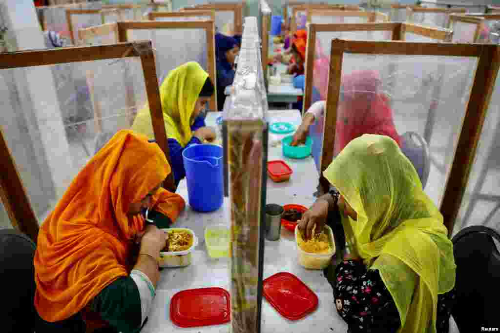 Employees dine at The Civil Engineering Limited garment factory in Dhaka, Bangladesh.