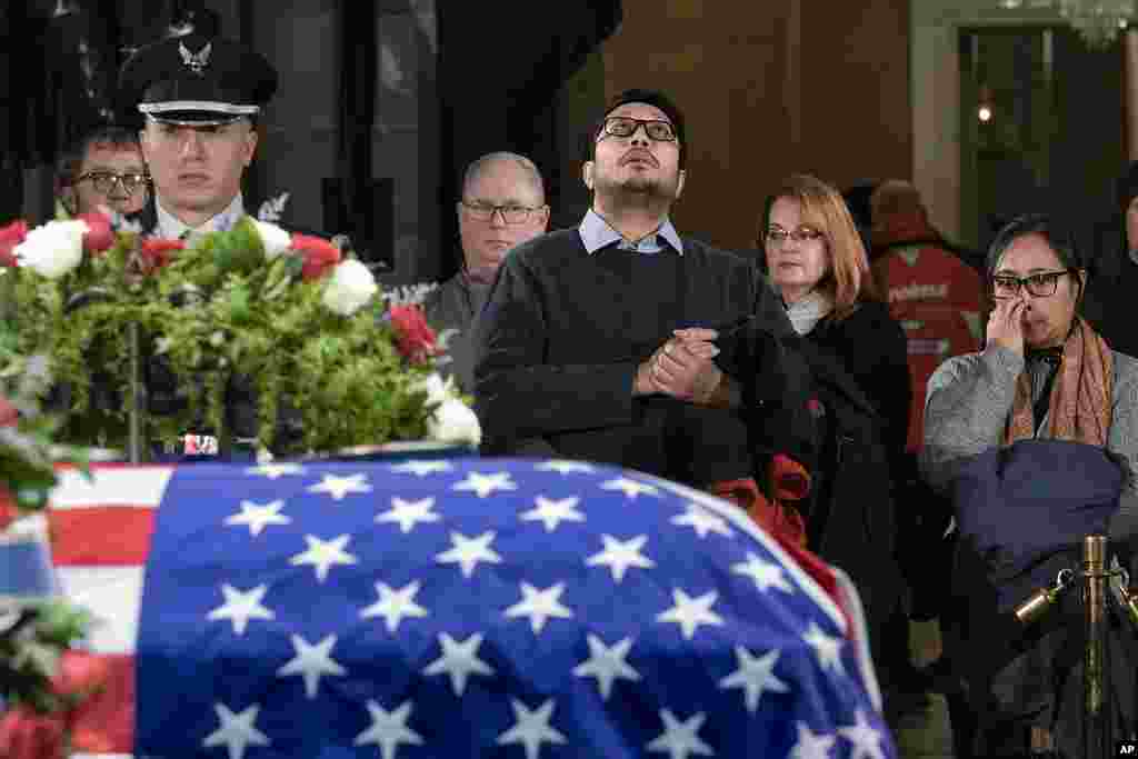 Mourners pay their respects as former President Jimmy Carter lies in state at the Capitol Rotunda in Washington, Jan. 8, 2025. 