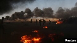 در اثر حملات قوای اسرائیلی بر معترضین فلسطینی روز دو شنبه حدود ۶۰ نفر کشته و صد های نفر دیگر زخمی گردید