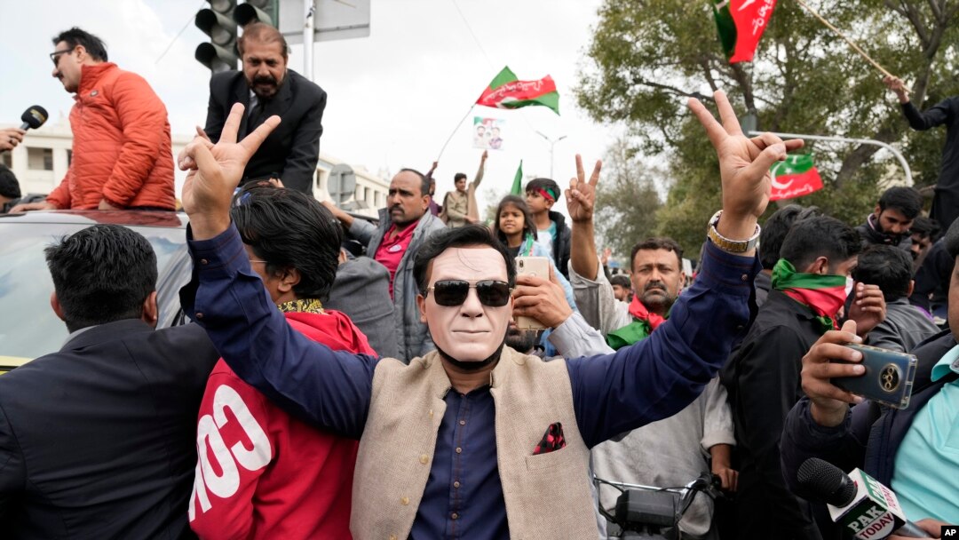 Supporters of former Pakistani Prime Minister Imran Khan chant slogans during a protest against the Pakistan Election Commission in Lahore, Pakistan, on March 2, 2024.