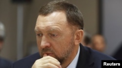 德里帕斯卡在莫斯科出席與克拉斯諾亞爾斯克地區政府簽署協議的儀式。 2017年12月12日