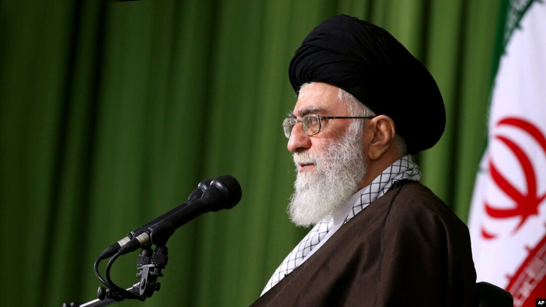 In this picture released by the office of Iranian supreme leader, Supreme Leader Ayatollah Ali Khamenei speaks in a meeting with Foreign Minister Mohammad Javad Zarif and the country's diplomats in Tehran, Nov. 1, 2015. Khamenei warned against importing consumer goods from the United States as the Islamic republic prepares for the lifting of sanctions under a landmark nuclear deal.