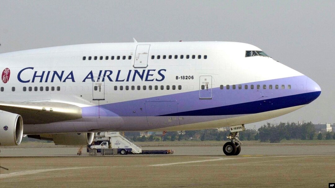 FILE - A China Airlines Boeing 747-400 sits on the tarmac at the Chiang Kai-shek International Airport in Taoyuan, Taiwan.