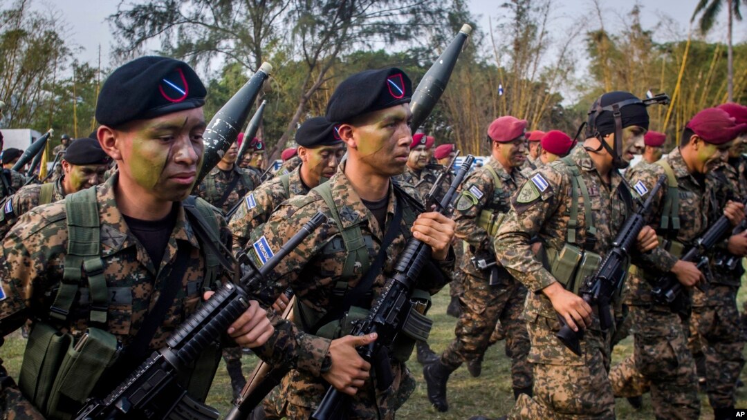 FILE - El Salvador army special forces march during a presentation to the press as part of a stepped-up phase in the government's fight against gangs in San Salvador, El Salvador, April, 20, 2016. The government of El Salvador deployed 1,000 soldiers and police to fight gangs in rural areas. 