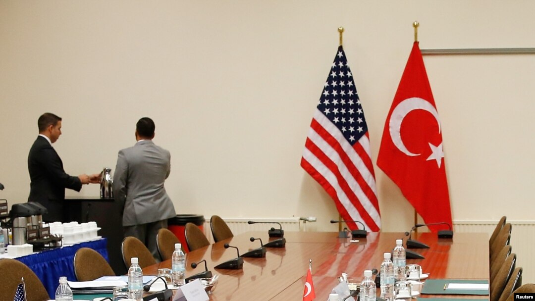 FILE - A U.S. and a Turkish flag are seen ahead of the start of a meeting between American and Turkish officials in Brussels, Belgium, Dec. 20, 2015. Thursday's bilateral talks will be held in Washington.