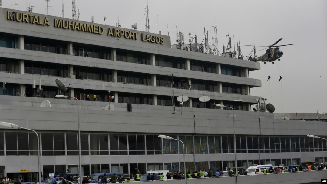 FILE - Nigerian Air Force special unit practices a counter-terrorism exercise at the Murtala Muhammed International Airport in Lagos, Nigeria.
