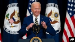 President Joe Biden arrives to deliver remarks to State Department staff, Feb. 4, 2021, in Washington.