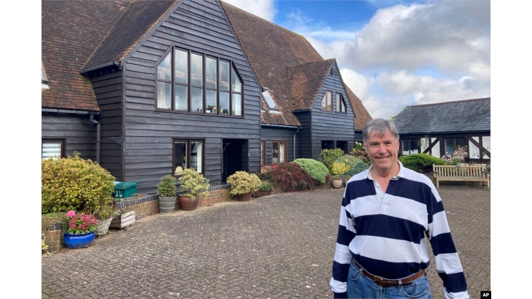 FILE - Stewart Lewis poses near his home in Abbots Langley, England, on Oct. 18, 2024.