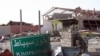 Khorsebat (or Khorsebad) is a village in ruins about 10 kilometers from Mosul. The only business in the area are two men selling olives and olive oil on Nov. 23, 2016 in Khorsebad, Iraq. (H.Murdock/VOA)